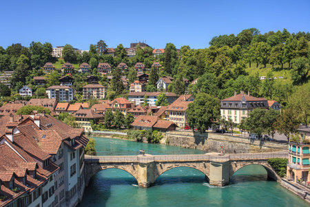 Bern, Switzerland - 11 June, 2014: view on the city with the Aare river in summertime. The city of...