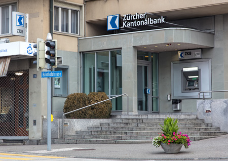 Wallisellen, Switzerland - 9 October, 2016: entrance to the Zurich Cantonal Bank office on Bahnhofstrasse street. Cantonal banks are commercial banks, which are provided with a guarantee for the assets held there by the canton in which they are based.のeditorial素材