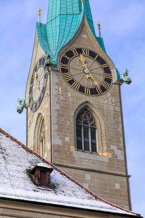 Clock of the Fraumunster cathedral in the city of Zurich, Switzerland, in wintertime.