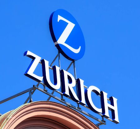 Basel, Switzerland - 27 August, 2016: Zurich Insurance Group sign on the top of a building. Zurich Insurance Group is the largest Swiss insurance company, headquartered in Zurich.のeditorial素材