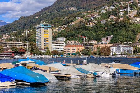 Lugano, Switzerland - 12 October, 2016: boats on Lake Lugano, mountain Monte Bre in the background. Lugano is the largest city of the Swiss canton of Ticino.のeditorial素材