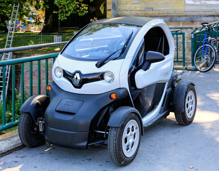 Zurich, Switzerland - 7 July, 2016: a Renault Twizy electric car parked on Museumstrasse street. The Renault Twizy is a battery-powered two-seat electric city car, designed and marketed by Renault, manufactured in Valladolid, Spain.のeditorial素材