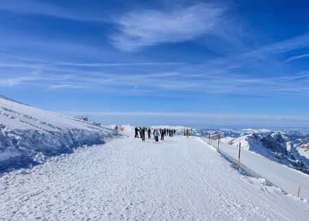 Mt. Titlis, Switzerland - 9 March, 2016: people on the walkway close to the top of the mountain. Titlis is a mountain, located on the border between the Swiss Cantons of Obwalden and Bern.のeditorial素材