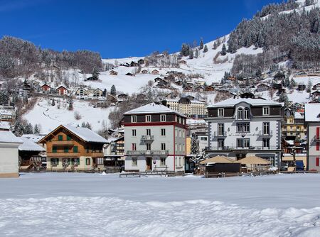 Engelberg, Switzerland - 9 March 2016: view of the town from Engelbergerstrasse street. Engelberg is a resort town and a municipality in the Swiss canton of Obwalden.のeditorial素材