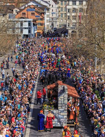 Zurich, Switzerland - 13 April, 2015: participants of the Sechselauten parade passing along Uraniastrasse street. The Sechselauten is a traditional spring holiday in the city of Zurich.のeditorial素材