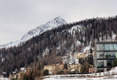 St. Moritz, Switzerland - 3 March, 2017: view of the town of St. Moritz on an overcast day at the very beginning of spring. St. Moritz is an Alpine resort and a munitipality in the Engadine region of the Swiss canton of Graubunden.のeditorial素材