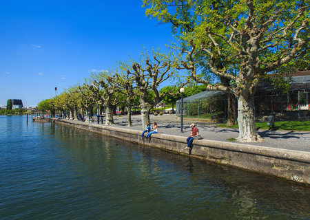 Zug, Switzerland - 6 May, 2016: embankment of Lake Zug in the city of Zug. Lake Zug is a lake in central Switzerland, situated between Lake Lucerne and Lake Zurich, the city of Zug is the capital of the Swiss canton of Zug.のeditorial素材