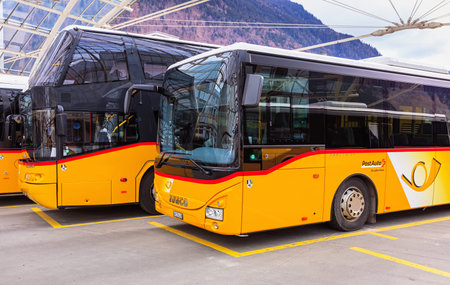 Chur, Switzerland - 3 March, 2017: Post Buses at the Chur bus station. Post Bus Switzerland (German:...