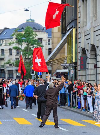 Zurich, Switzerland - 1 August, 2016: people on Uraniastrasse street during the celebration of the Swiss National Day. The Swiss National Day is the national holiday of Switzerland, celebrated on 1 August.のeditorial素材