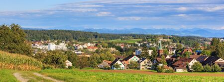View of the town of Dietlikon in the Glatt Valley region of the Swiss canton of Zurich. The picture was taken in the beginning of September.の写真素材