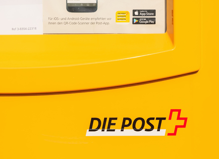 Wallisellen, Switzerland - 23 September, 2017: partial view of a letter box of the Swiss Post. The Swiss Post is the national postal service of Switzerland, being a public company owned by the Swiss Confederation, it is the country's second largest employのeditorial素材