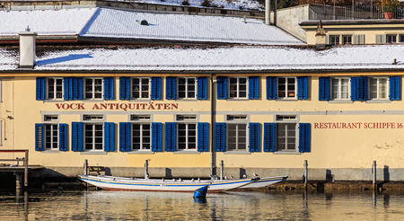 Zurich, Switzerland - 1 February, 2015: historic buildings of the city of Zurich along the Limmat river in winter. Zurich is the largest city in Switzerland and the capital of the Swiss canton of Zurich.のeditorial素材