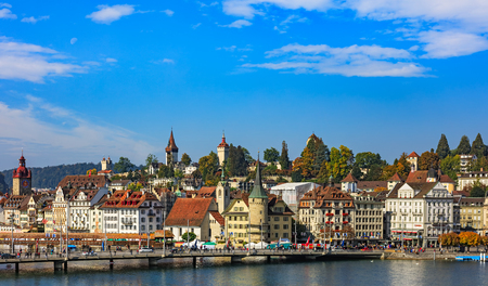 Lucerne, Switzerland - 3 October, 2015: buildings of the city of Lucerne along Lake Lucerne and the Reuss river. Lucerne is a city in central Switzerland, it is the capital of the Swiss canton of Lucerne and the capital of the district of the same name.のeditorial素材
