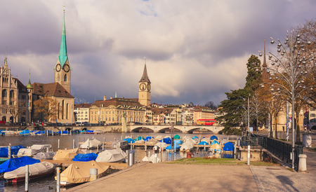 Zurich, Switzerland - 26 November, 2013: the Limmat river, towers of the Fraumunster cathedral and St. Peter church. Zurich is the largest city in Switzerland and the capital of the Swiss canton of Zurich.のeditorial素材