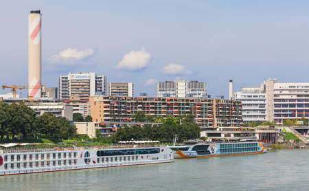 Basel, Switzerland - 6 August, 2014: the Rhine river in the city of Basel, buildings of the city along the river. Basel is a city on the Rhine river in northwestern Switzerland, located where the Swiss, French and German borders meet.のeditorial素材