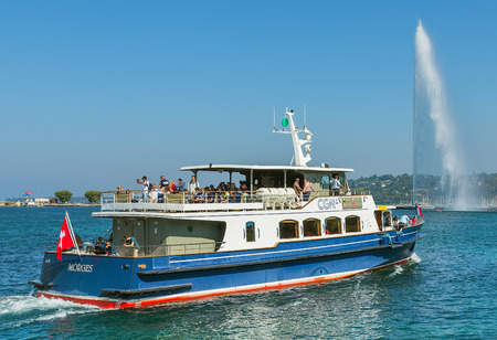 Geneva, Switzerland - 24 September, 2016: Lake Geneva as seen from the city of Geneva, MS Morges passing with people on board. Lake Geneva is a lake on the north side of the Alps, shared between Switzerland and France.のeditorial素材