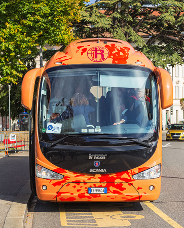 Lugano, Switzerland - 12 October, 2016: a bus from Italy at a stop in the city of Lugano. Lugano is the largest city of the Swiss canton of Ticino, located close to the border between Switzerland and Italy.のeditorial素材