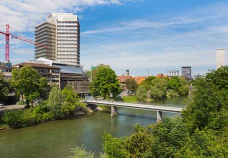 Zurich, Switzerland - May 27, 2019: buildings of the city of Zurich along the Limmat river. Zurich is the largest city in Switzerland and the capital of the Swiss canton of Zurich.のeditorial素材