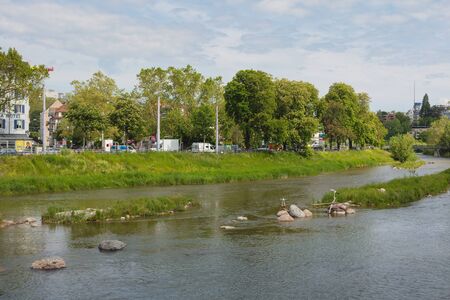 Zurich, Switzerland - May 27, 2019: the Sihl river in the city of Zurich, traffic on its embankment. Zurich is the largest city in Switzerland and the capital of the Swiss canton of Zurich.のeditorial素材