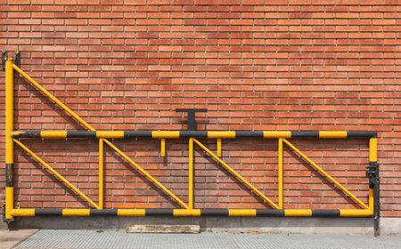 A brick wall of a building gate