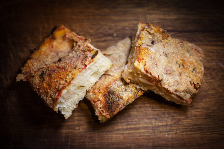 Photos of sfincione a Sicilian pizza