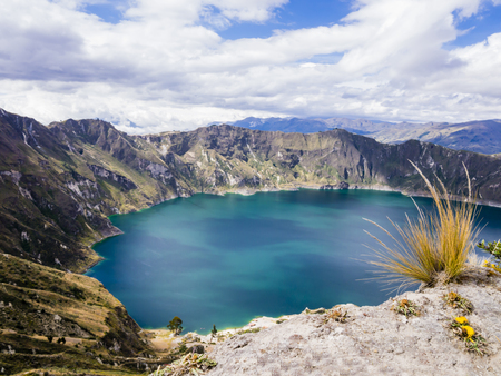 Turquoise waters of Quilotoa lagoon, volcanic crater lake in Ecuadorの写真素材