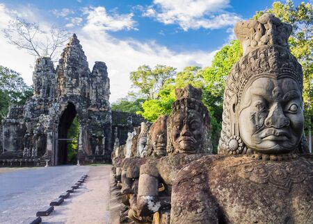 Row of demons statues in the South Gate of Angkor Thom complex, Siem Reap, Cambodiaの写真素材