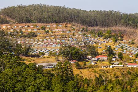 Panoramic view of typical village with colorful houses arranged in geometric manner, Swaziland, South Africaの写真素材