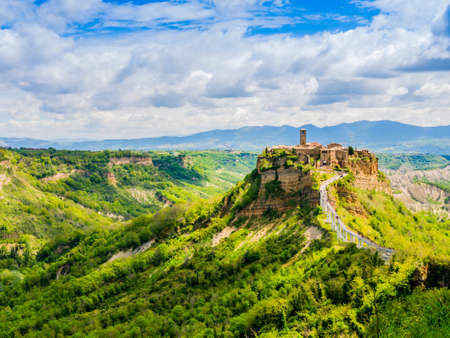 Impressive view of Civita di Bagnoregio, ghost mediaeval town built above a plateau of friable vulcanic tuff, Lazio, central Italyの写真素材