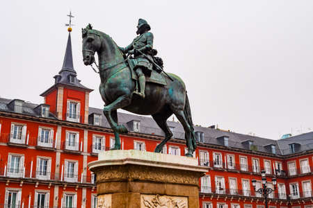 Stunning view of Plaza Mayor with statue of King Philip III in foreground, Madrid, Spainのeditorial素材