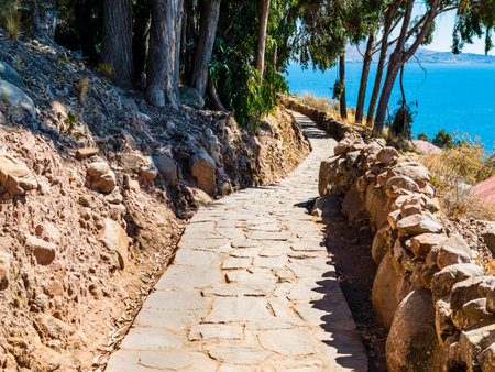 Scenic stone path on island Taquile, Lake Titicaca, Puno region, Peruの写真素材