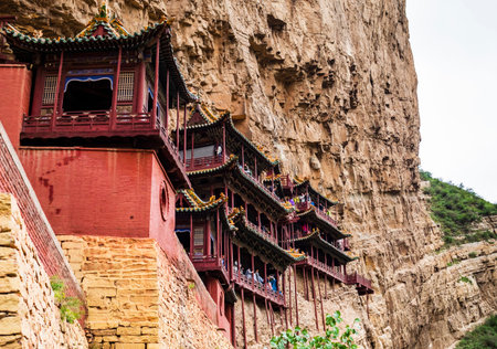 Impressive view of Xuankong Temple, the hanging monastery built into a cliff near Datong, Shanxi province, Chinaの写真素材