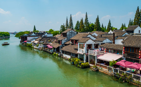 Impressive view of Zhujiajiao village with historic buildings overlooking the canals that cross the town, Shanghai, Chinaの写真素材