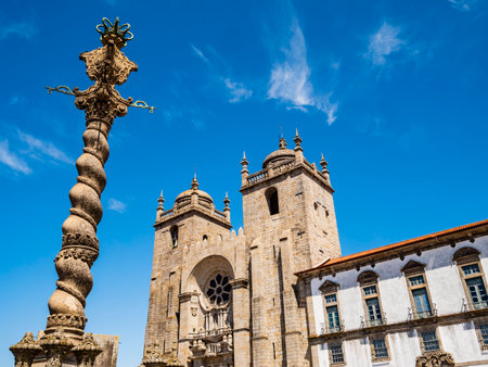 Stunning view of city pillory and facade of the Porto Cathedral, Portugalの写真素材