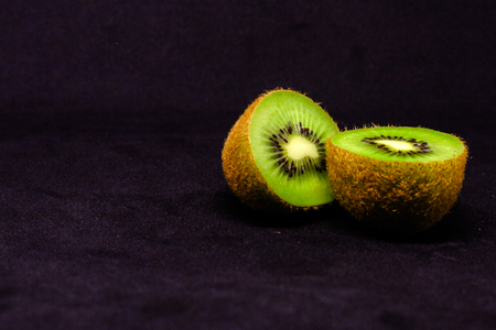 kiwi at black backgroundの写真素材