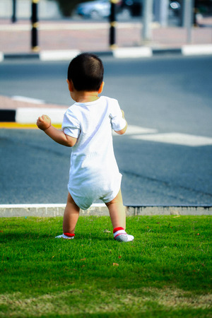children playing on the grassの写真素材