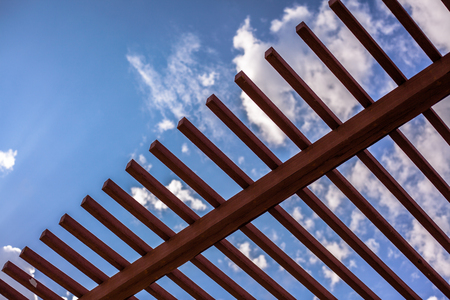 white fence and blue skyの写真素材