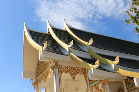 Thai temple roof with skyの写真素材
