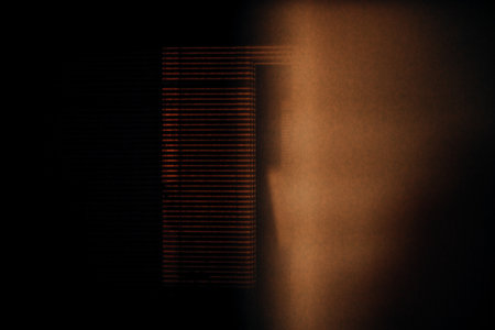 abstract background of a dark room with a beam of light from the windowの写真素材