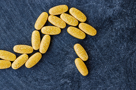 close-up of multivitamin and mineral supplement tablets. dietary concept. dietary supplement topview.の写真素材
