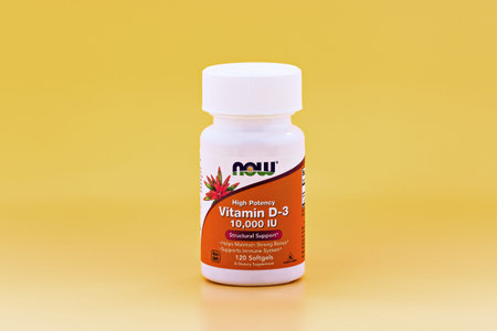 close-up of vitamin d-3 softgels in the jar. dietary concept. dietary supplementのeditorial素材