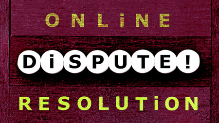 Photo on online dispute resolution theme. The phrase "online dispute resolution", on a grunge background. Dispute resolution techniques concept imageの写真素材
