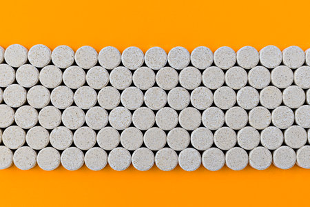 close-up of DGL (licorice root extract) chewable tablets. dietary concept. dietary supplement topviewの写真素材