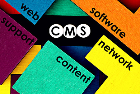 Photo on CMS (content management system) theme. The abbreviation  "CMS" on a colorful background. Technology concept imageの写真素材