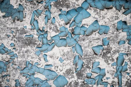 texture of old paint and Wallpaper on the wall of an old houseの写真素材