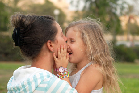 mom plays with her daughter love