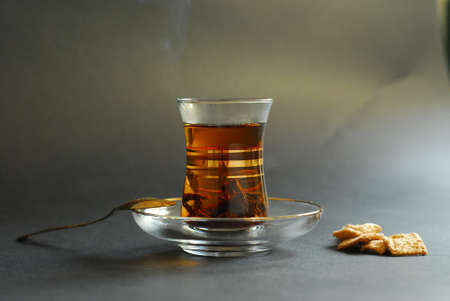 hot cup of tea with cereal for breakfast, dinnerの写真素材