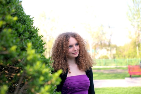 portrait of a smiling girl glowing in the sunの写真素材