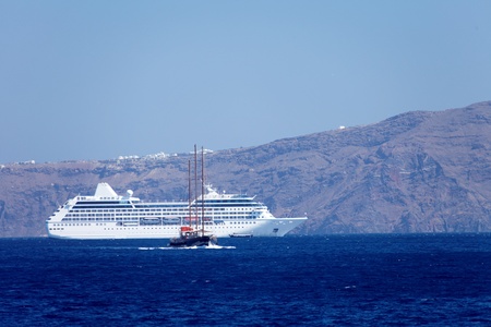 ship off the coast of the island day summerの写真素材
