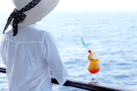 girl in a hat with a glass travel